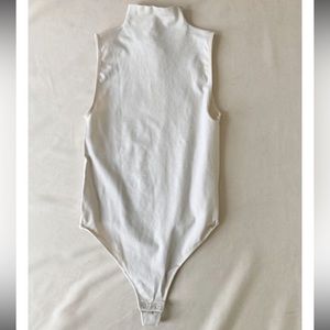 Babaton XS cream bodysuit